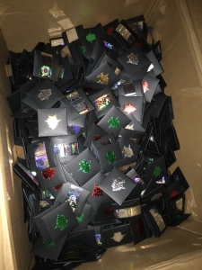 once again we show you one of the many of boxes containing thousands and thousands of our fortune cookies I don’t know if it was more fun to make them or to give them out but everyone who opens one smiles.
